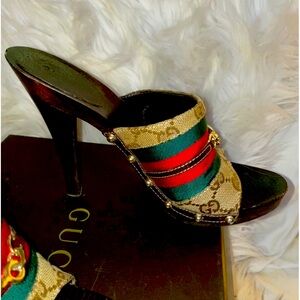 GUCCI
Beige/Ebony GG Canvas Vintage Web Horsebit Wood Mule Slide Sandals